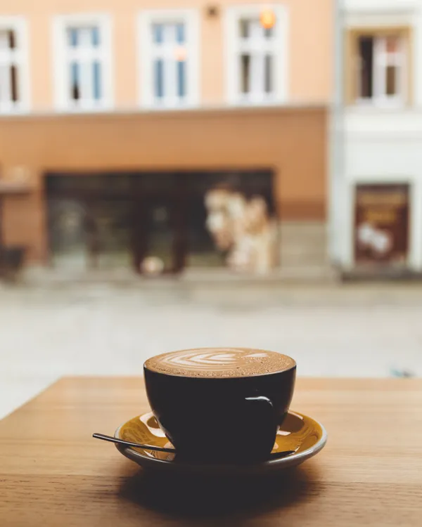 Coffee cup with street background